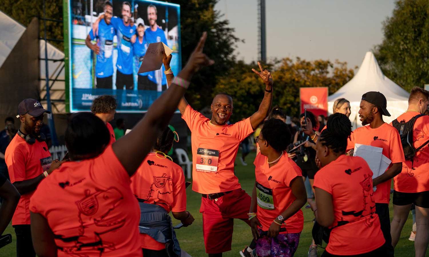 J.P. Morgan Corporate Challenge Johannesburg: team in orange shirts