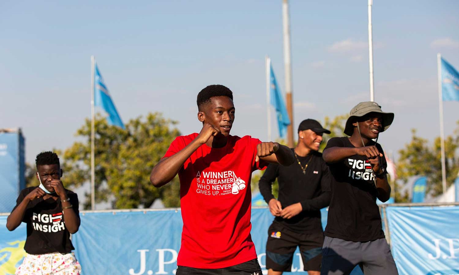 J.P. Morgan Corporate Challenge Johannesburg: team celebrating in red shirts